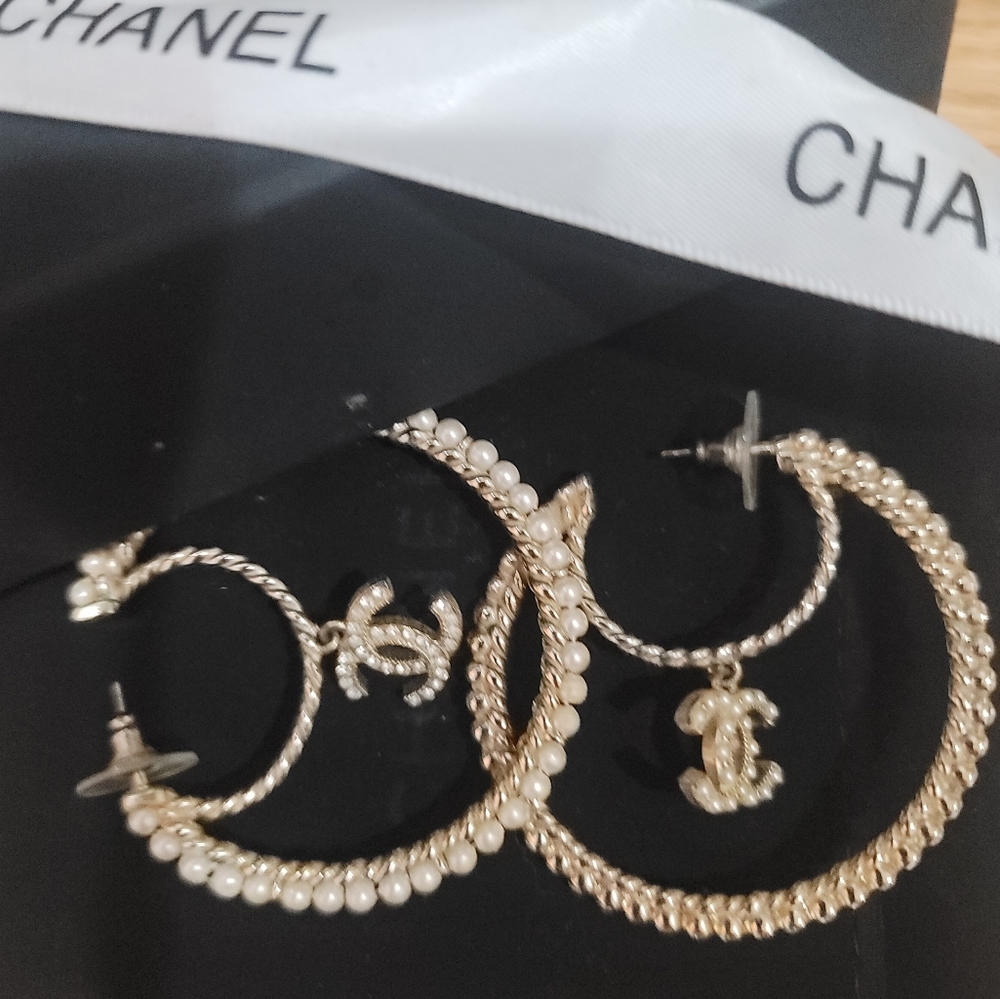 Authentic Chanel asymetrical hoop earrings